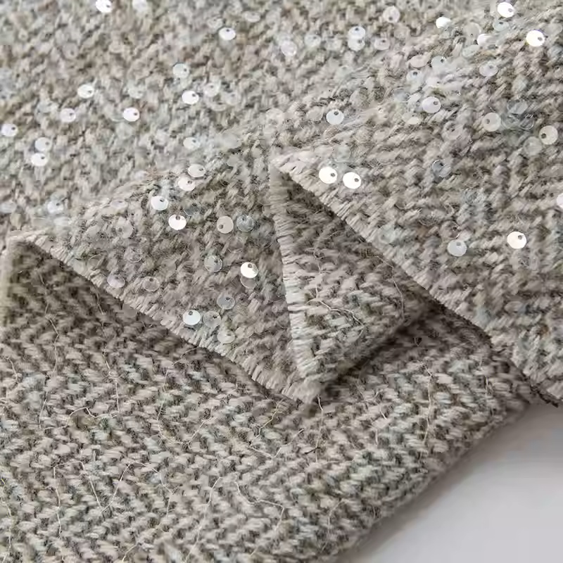 Lichtgrijs met pailletten gare - Sewing Tweed recensie en prijs